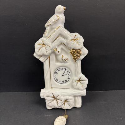 LOT 143: Vintage Hand-Painted Landscape Wall Pockets along with Vintage Cuckoo Clock Wall Pockets