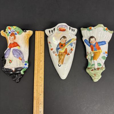 LOT 148: Vintage Wall Pocket Collections: Cuckoo Clock, Floral, Figurine