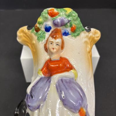 LOT 148: Vintage Wall Pocket Collections: Cuckoo Clock, Floral, Figurine