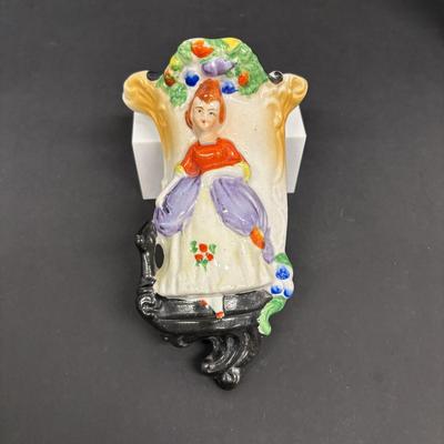 LOT 148: Vintage Wall Pocket Collections: Cuckoo Clock, Floral, Figurine