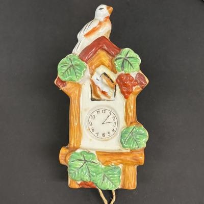 LOT 148: Vintage Wall Pocket Collections: Cuckoo Clock, Floral, Figurine