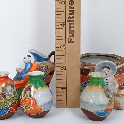 LOT 152: Vintage Japan Enameled and Handpainted Porcelain Figurines Set of (17)