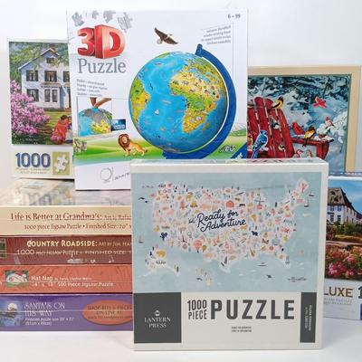 LOT 154: Set of (9) Puzzles - 3D Globe Puzzle with 1000 Pc and 500 Pc Puzzles