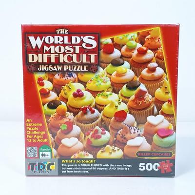 LOT 156: NIP Set of (8) 500 and 1000 Pc Puzzles