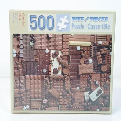 LOT 156: NIP Set of (8) 500 and 1000 Pc Puzzles