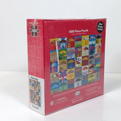 LOT 156: NIP Set of (8) 500 and 1000 Pc Puzzles