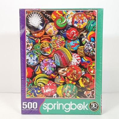 LOT 156: NIP Set of (8) 500 and 1000 Pc Puzzles