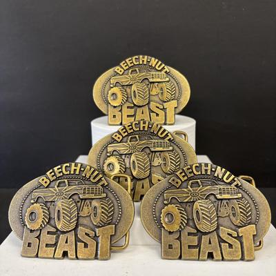 LOT 169: Beech-Nut Beast Tobacco Promotional Belt Buckles