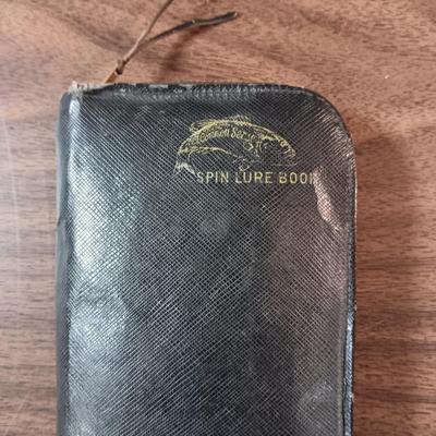 VINTAGE FISHING LURES IN A SPIN LURE BOOK