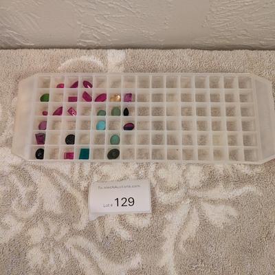 assortment of multi colored glass or gemstones for jewelry making