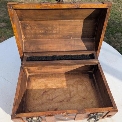 vintage wooden pirate treasure chest jewelry box with lion head accents.