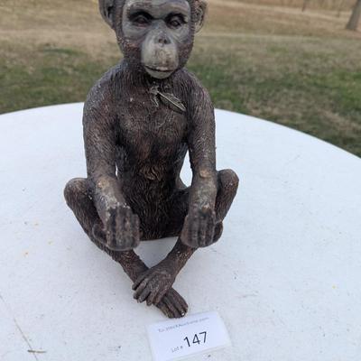 Money statue with red bandana