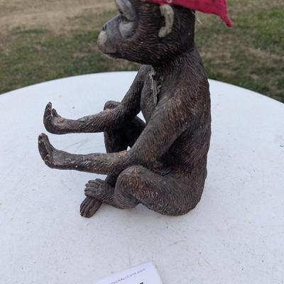 Money statue with red bandana