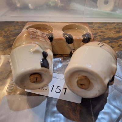 vintage ceramic Humpty Dumpty salt and pepper shakers set, likely from Japan in the 1950s