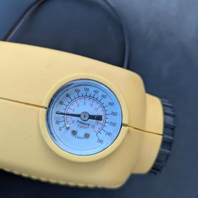  12V air compressor or tire inflator.