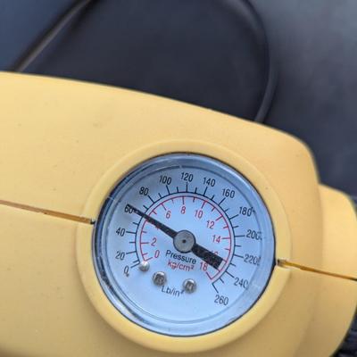  12V air compressor or tire inflator.