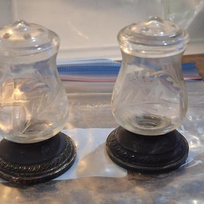 Quaker Silver Co. "Hurricane" weighted sterling silver and etched glass salt and pepper shakers.