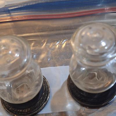 Quaker Silver Co. "Hurricane" weighted sterling silver and etched glass salt and pepper shakers.