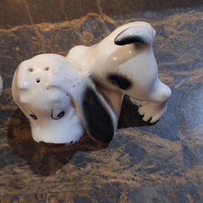 Mismatched salt and pepper shaker- basset hound for pepper and bowling pin for salt.