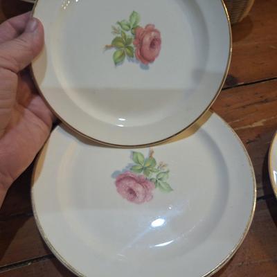 4 plates with pink rose