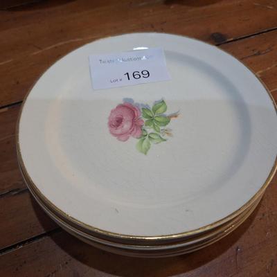 4 plates with pink rose