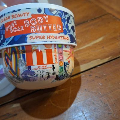 body butter, facial cleaning brush and facial serums