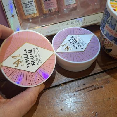 body butter, facial cleaning brush and facial serums