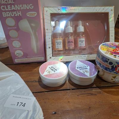 body butter, facial cleaning brush and facial serums