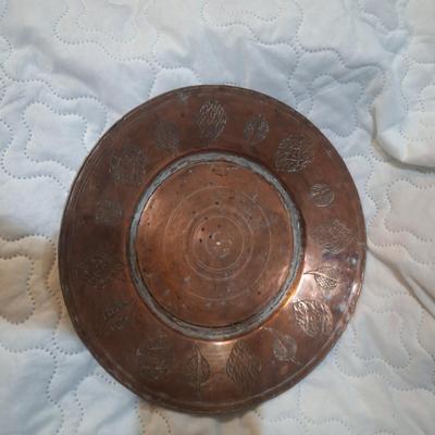 handcrafted coppoer plates engraved and hammered designs