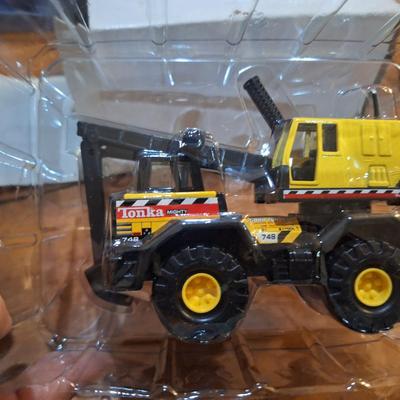 Tonka might backhoe toy  new in package