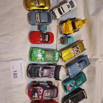 mixed lot of Disney pixar cars and other pocket size vehicles.