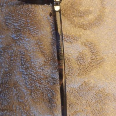 Foster Grant sunglasses with tortoise shell colored frames.