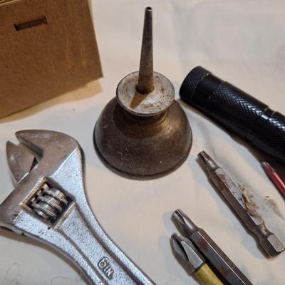 mixed lot of hand tools, crescent wrench, snips, flashlight, oil can and bits