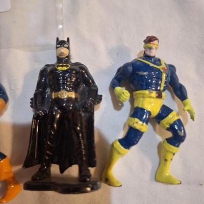 4 small die cast figures by Toy Biz