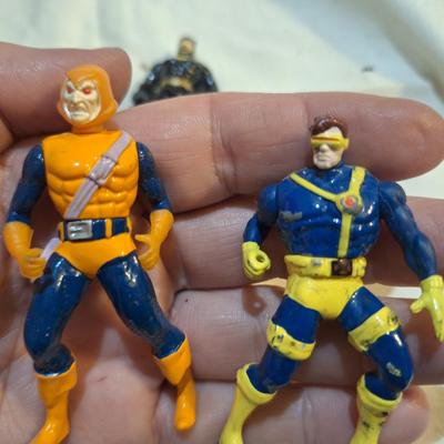 4 small die cast figures by Toy Biz
