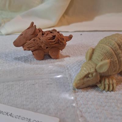 small armadillo figurines