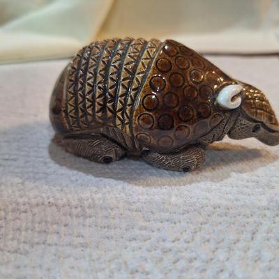 ceramic or pottery aramdillo figurine