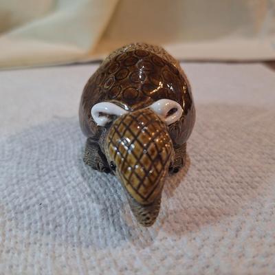 ceramic or pottery aramdillo figurine