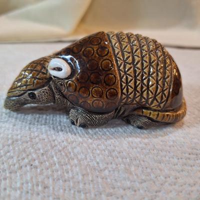 ceramic or pottery aramdillo figurine