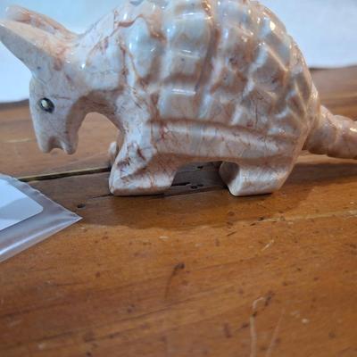 carved stone aramdillo figurine