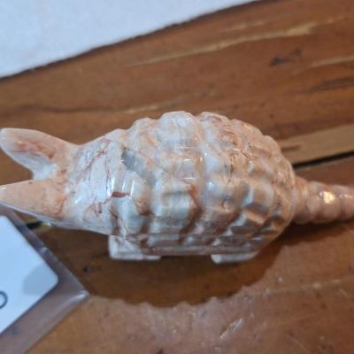 carved stone aramdillo figurine