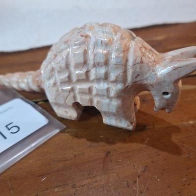 carved stone aramdillo figurine