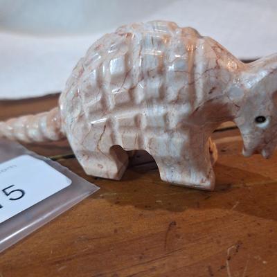 carved stone aramdillo figurine