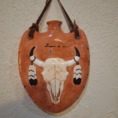 southwestern style ceramic canteen wall hanging or vase with longhorn skull and feather design