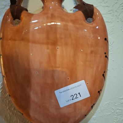 southwestern style ceramic canteen wall hanging or vase with longhorn skull and feather design