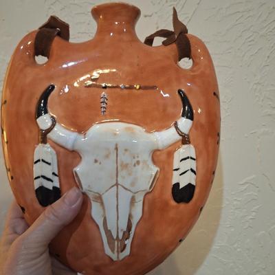 southwestern style ceramic canteen wall hanging or vase with longhorn skull and feather design
