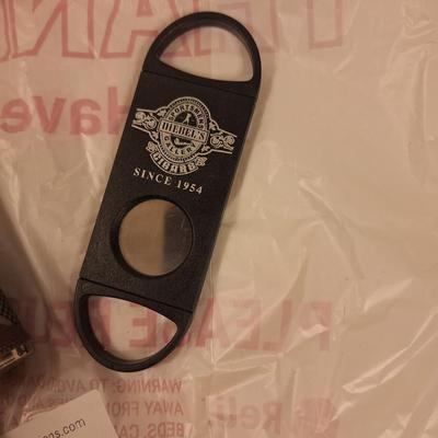 camo covered stainless steel flask and cigar cutter