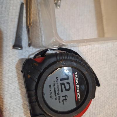 mixed lot of hand tools, tape measure, bits, and more