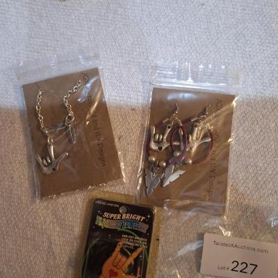 3 pieces of jewelry 2 which have the I love you sign language symbol