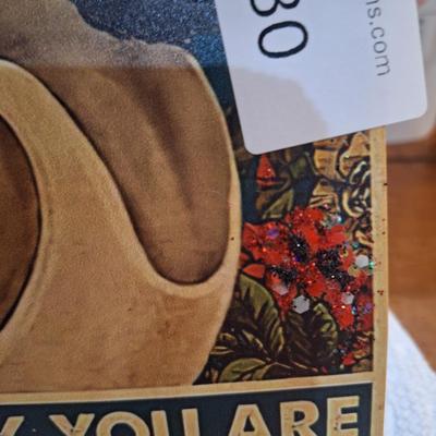 small metal sign, with the Bride of Frankenstien- I see your scars